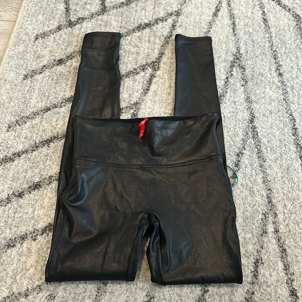 NWOT. Never worn. Spanx Faux Leather Spanx. Regular size small.